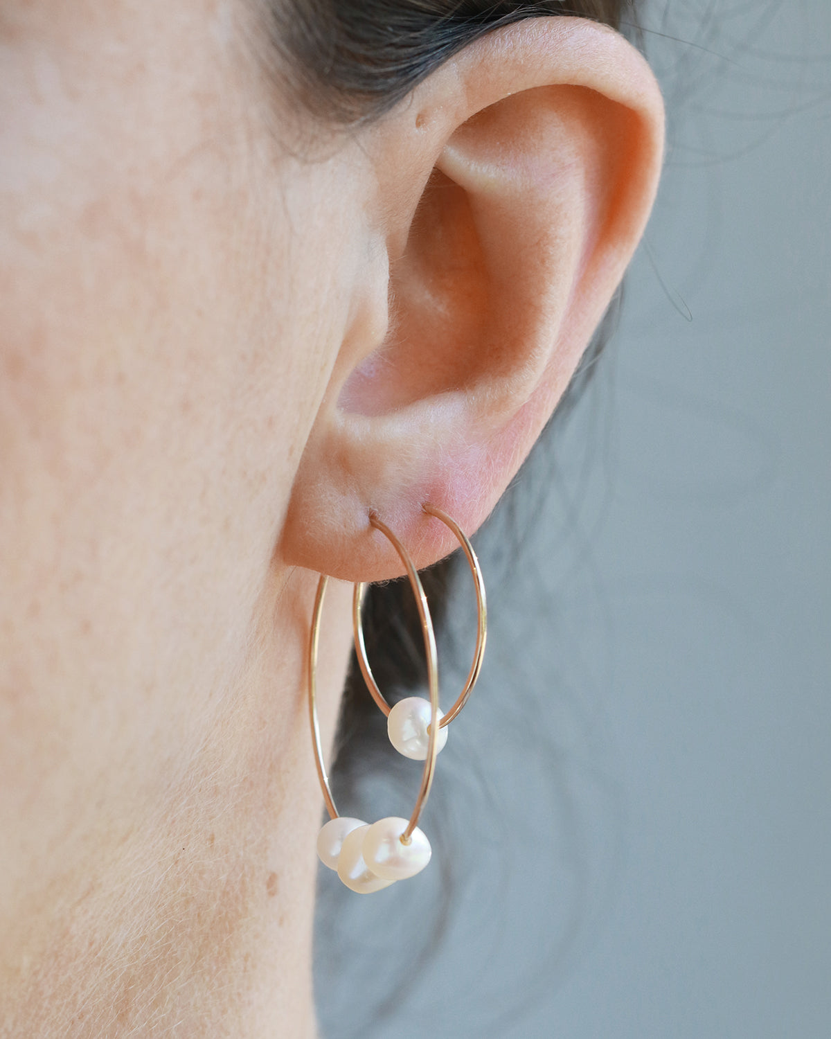 pearl hoops on model