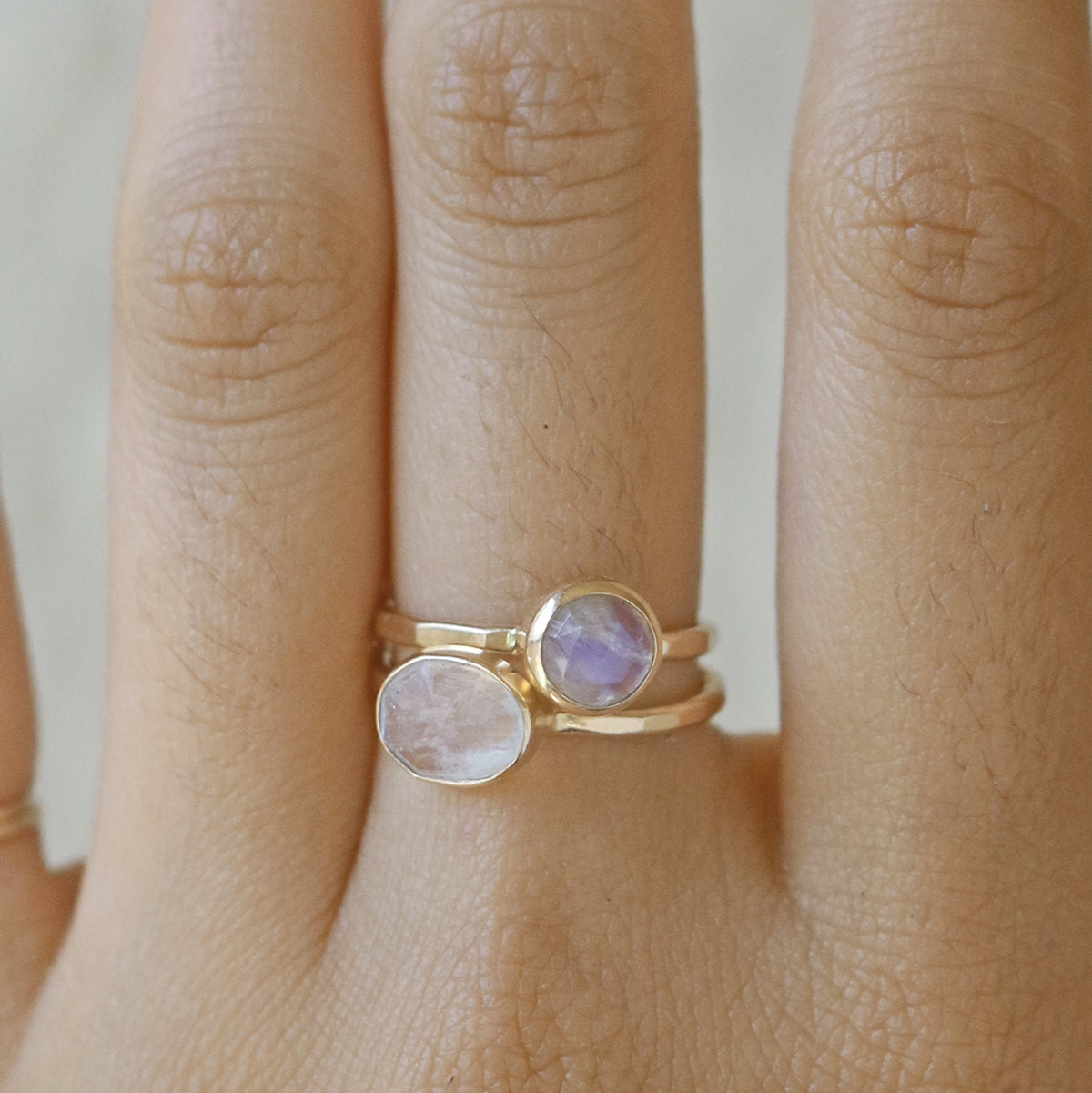 rainbow moonstone rings on model