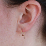 1/2 Inch Wishbone Hoop Earrings Earrings E2239onmodelstory